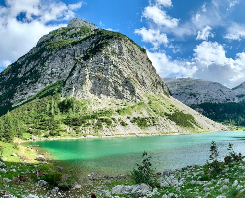 pretty green alpine lake in the mountains of slovenia