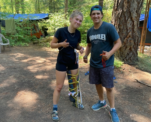 teen boy and girl practicing for their wilderness first responder course