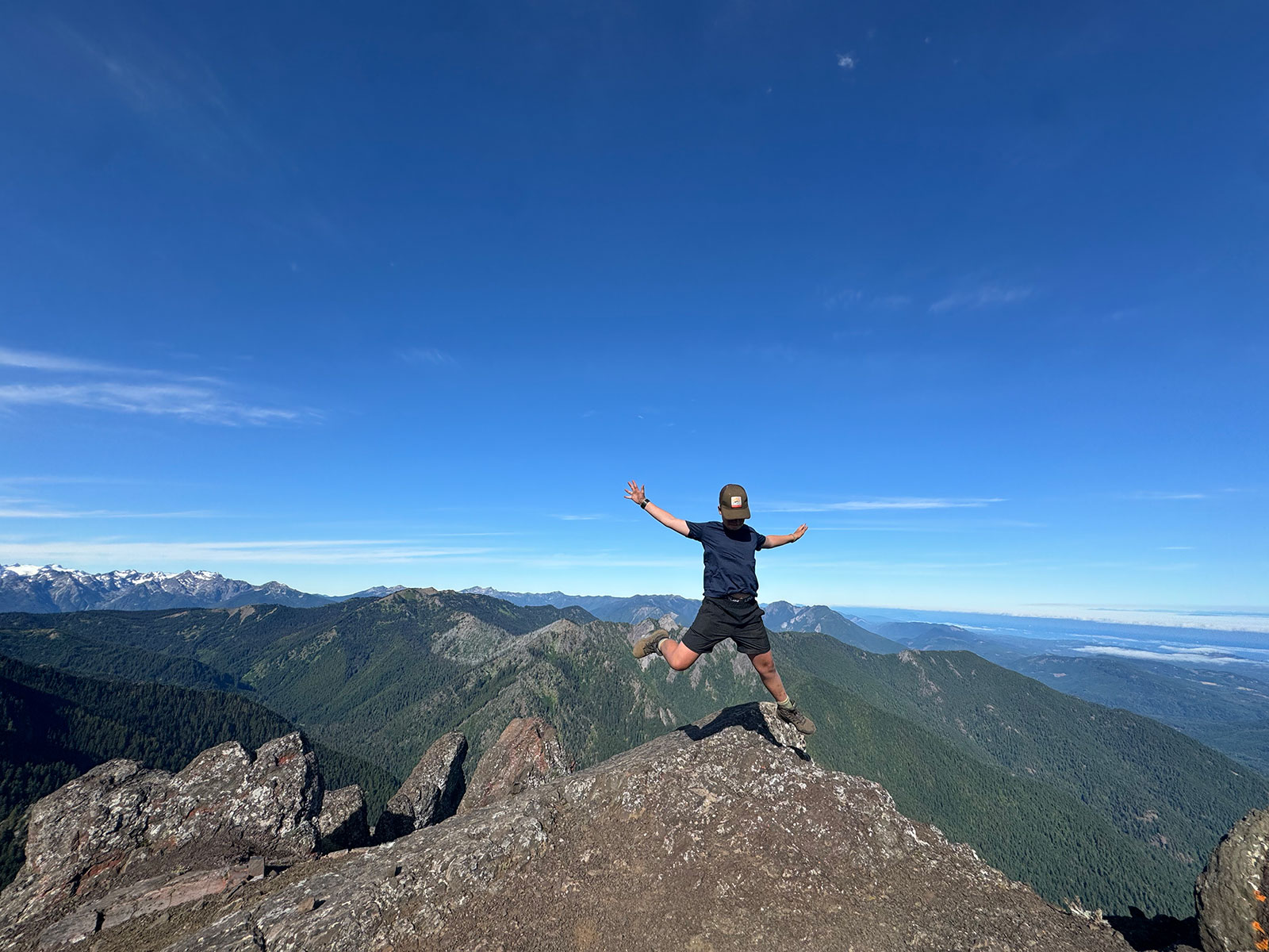 PNWA-boy-jumping-on-mountain-in-olympics
