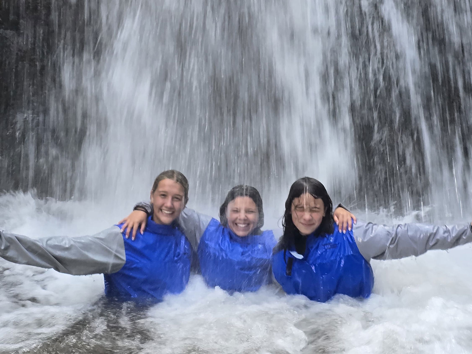 Peru-kids-under-waterfall Peru-kids-under-waterfall