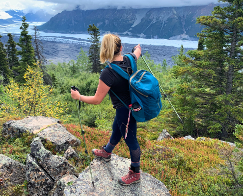 young woman looking at the views around her at teen adventure camp young woman looking at the views around her at teen adventure camp