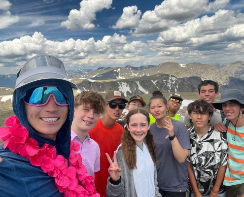 colorado-explorer-group-of-teens-at-summit-in-national-park colorado-explorer-group-of-teens-at-summit-in-national-park