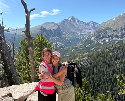 girls-hiking-to-mountain-summit-colorado girls-hiking-to-mountain-summit-colorado