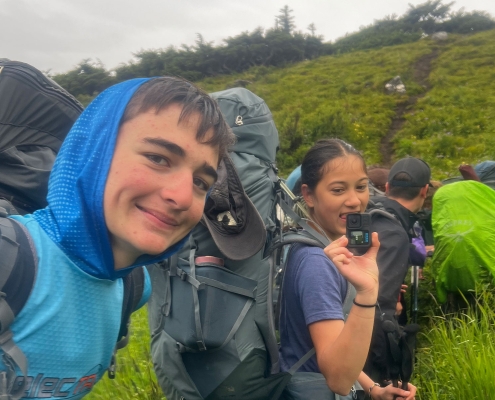kids-backpacking-taking-selfie-alaska kids-backpacking-taking-selfie-alaska